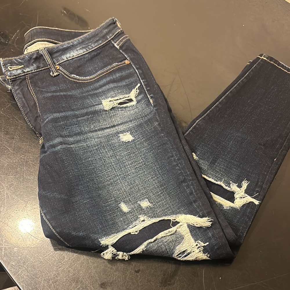 Buckle ankle ripped skinny jeans like new.